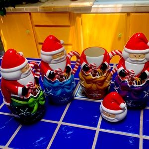 Temptations New in box set of 4 Santa mugs.
